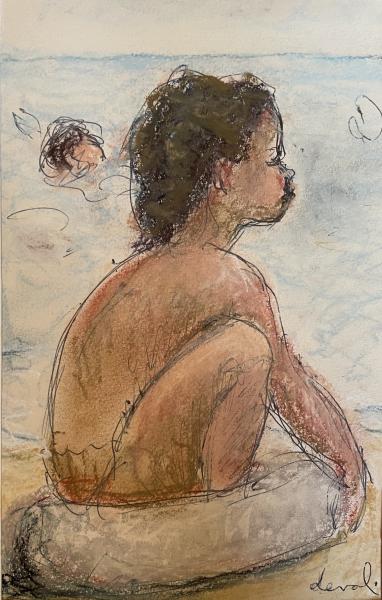 Petite fille assise dans une bouée